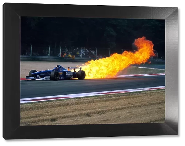 Formula One World Championship: Jarno Trulli Prost AP01 has a huge oil fire during practice