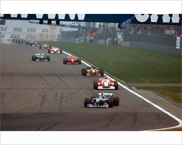 Formula One World Championship: Winner Jacques Villeneuve Williams FW18 leads David Coulthard