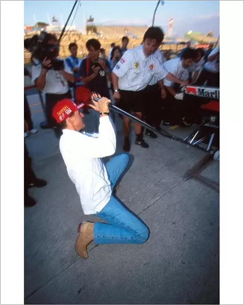 Formula One World Championship: Michael Schumacher Ferrari F310 finds out how hard a mechanics job is