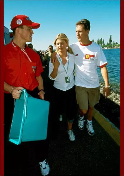 Formula One World Championship: Ralf Schumacher with Corinna Schumacher and Michael Schumacher Ferrari