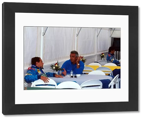 Formula One World Championship: Gerhard Berger Benetton B197 with Flavio Briatore Benetton F1 Boss, right
