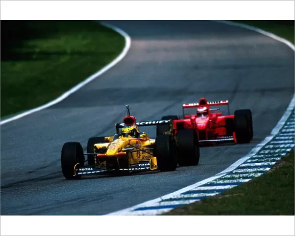Formula One World Championship: The brothers Ralf Schumacher Jordan, leads Michael Schumacher Ferrari