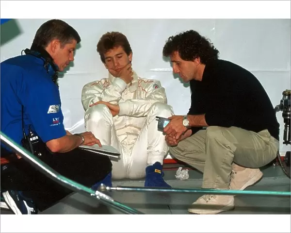Formula One World Championship: Team owner Alain Prost gives instructions to Jarno Trulli, who was drafted in to the Prost team as a replacement