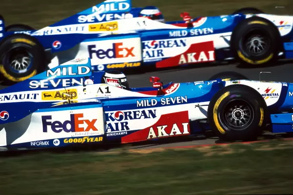 Formula One World Championship: Mirror image of Benetton drivers, Gerhard Berger Benetton and Jean Alesi Benetton