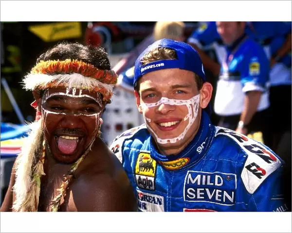 Formula One World Championship: Alexander Wurz Benetton Playlife B199 and local Aborigine