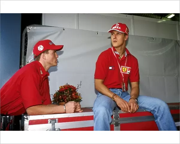 Formula One World Championship: The brothers Schumacher, Ralf and Michael, right