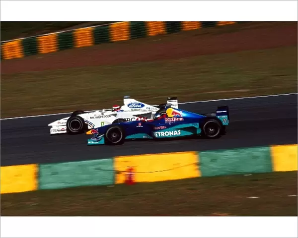 Formula One World Championship: Johnny Herbert Stewart Ford SF3 passes Jean Alesi Sauber Petronas C18