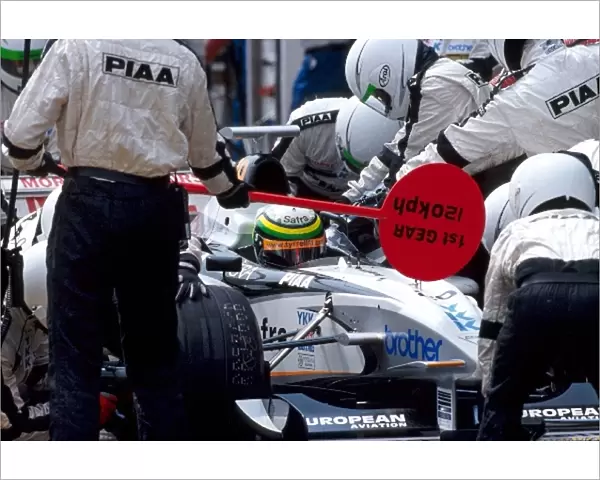 Formula One World Championship: Race retiree Ricardo Rosset Tyrrell 026 makes a pit stop