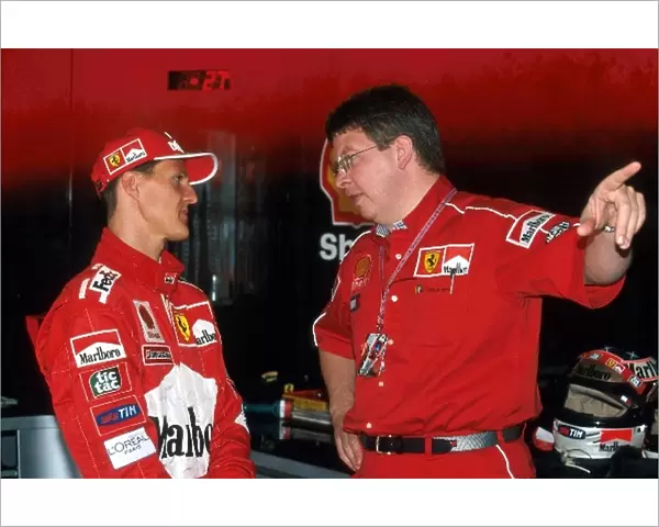 Formula One World Championship: Michael Schumacher Ferrari F399, 2nd place talks with Ross Brawn