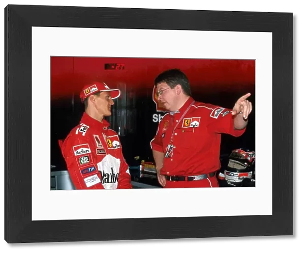 Formula One World Championship: Michael Schumacher Ferrari F399, 2nd place talks with Ross Brawn