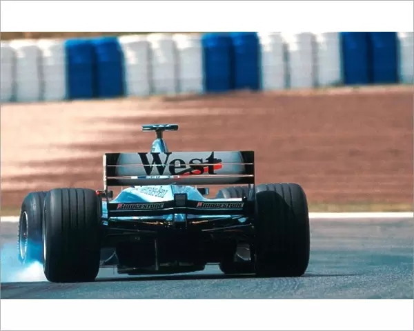 Formula One World Championship: David Coulthard Mclaren MP4-14 locks his brakes