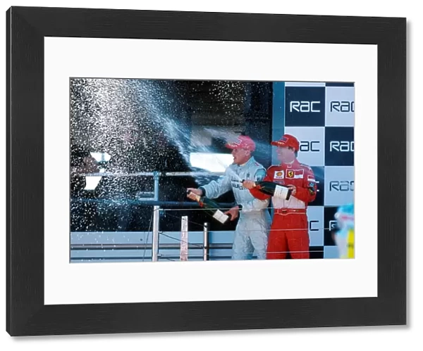 Formula One World Championship: Winner David Coulthard, left and Eddie Irvine, 2nd