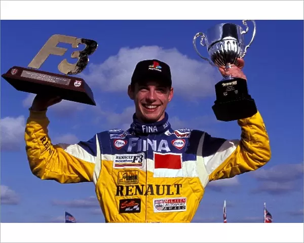 British Formula 3 Championship: Race winner Jenson Button Promatecme celebrates with his trophies