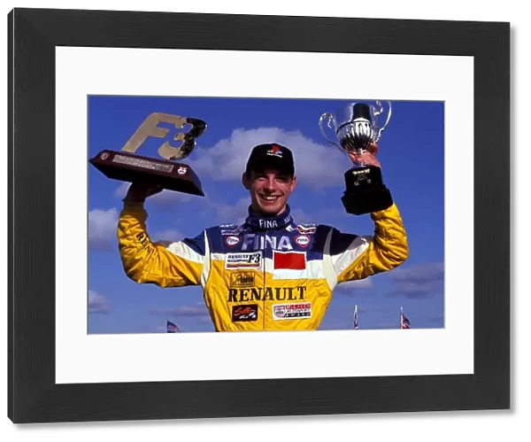 British Formula 3 Championship: Race winner Jenson Button Promatecme celebrates with his trophies