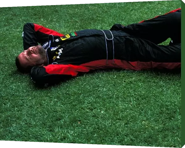 Formula One World Championship: Paul Stoddart Minardi Team Principal relaxes on the Melbourne lawns
