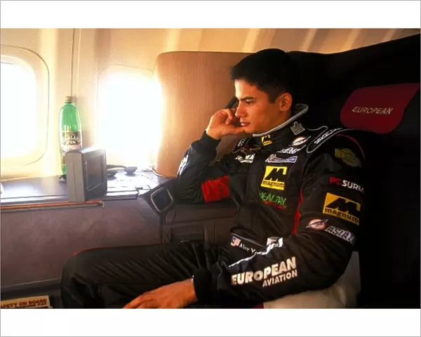 Formula One World Championship: Alex Yoong Minardi, relaxes on the flight to Australia