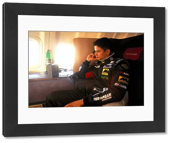 Formula One World Championship: Alex Yoong Minardi, relaxes on the flight to Australia