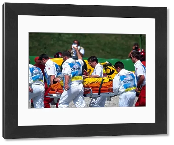 Formula One World Championship: Takuma Sato Jordan is removed from the circuit after a huge accident