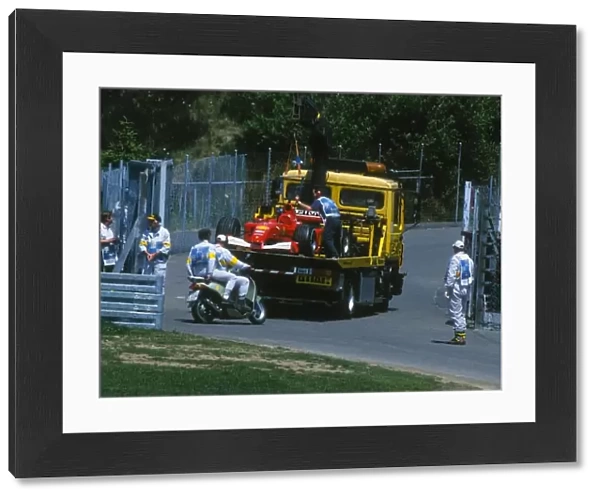 Formula One World Championship: Marshals recover Michael Schumachers car just before the race