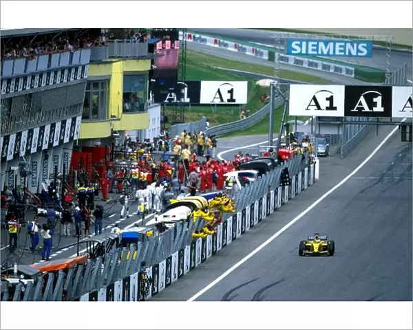 Formula One World Championship: Giancarlo Fisichella Jordan Honda EJ12 crosses the line in 5th place to give the team its first points of the season