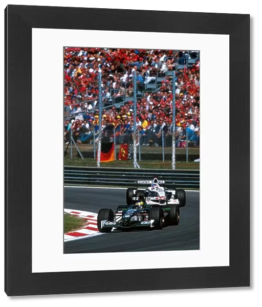 Formula One World Championship: Fifth place finisher Pedro de la Rosa Jaguar R2 leads Jacques Villeneuve BAR 003 who finished sixth