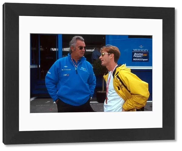 Formula One World Championship: Flavio Briatore Benetton Manager talks with his driver for the following season Jarno Trulli Jordan