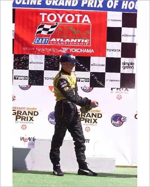 Toyota Atlantic Championship: Joey Hand sprays champagne after winning the Atlantic race at the Houston GP