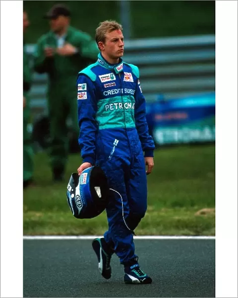Formula One Testing: Kimi Raikkonen Sauber Petronas C20 walks back to the pits