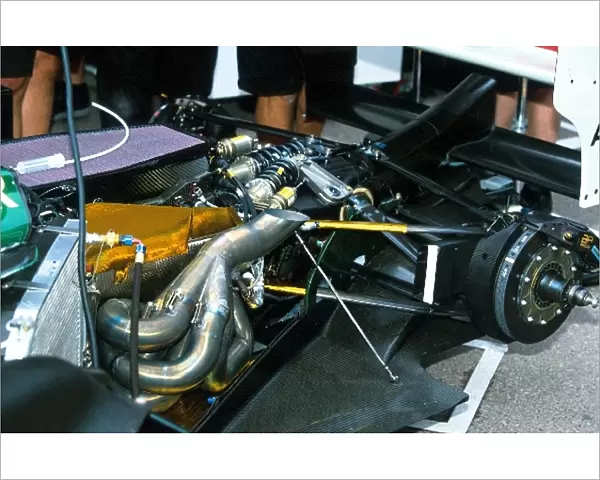 Formula One World Championship: The uncovered rear of the Jaguar R3 showing the Cosworth V10 engine