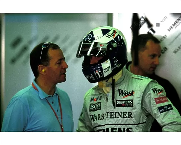 Formula One World Championship: Martin Brundle ITV Commentator speaks with David Coulthard McLaren