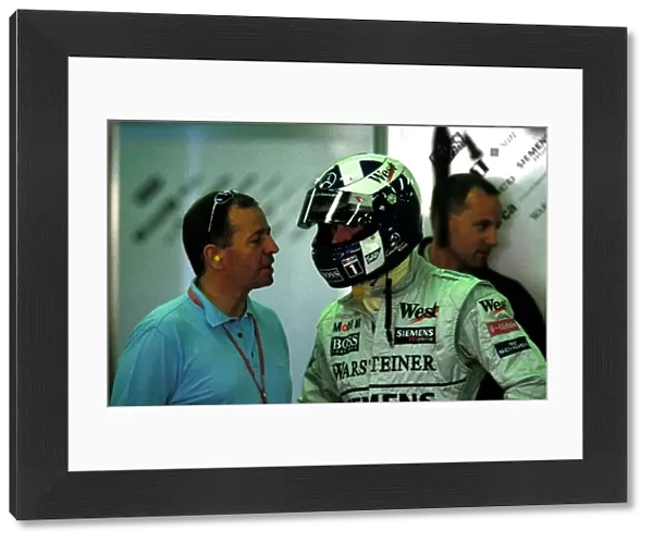 Formula One World Championship: Martin Brundle ITV Commentator speaks with David Coulthard McLaren