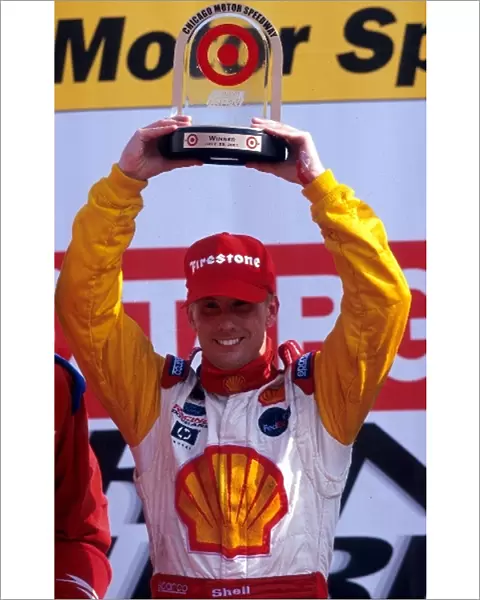Fedex Cart Championship Series: Race winner Kenny Brack Team Rahal Lola Ford celebrates victory on the podium