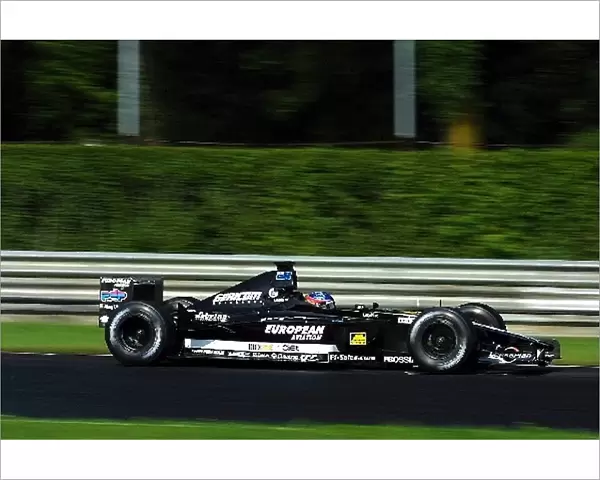Formula One Testing: Fernando Alonso European Minardi PS01 tests the new evolution Minardi, with new aerodynamics and gearbox