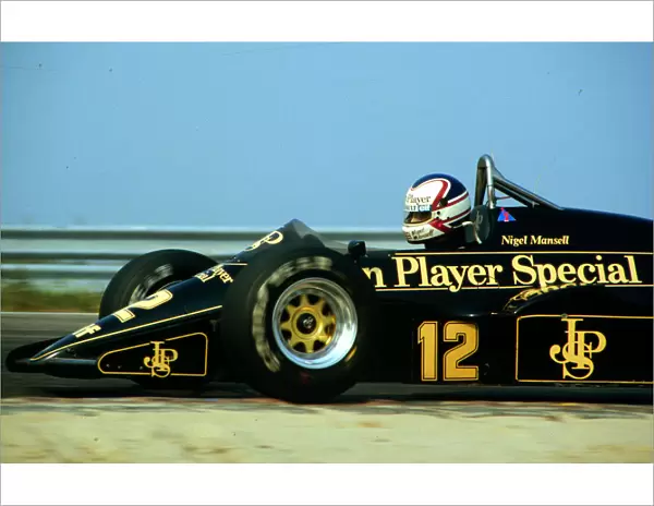 1984 DUTCH GP. Nigel Mansell, Lotus, finishes 3rd on the podium. Photo: LAT