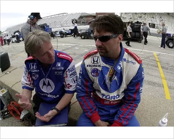 Michael Andretti talks to his engineer prior to practice for the Miller Lite 250. The Milwaukee Mile, Milwaukee, Wi. 31 May, 2002