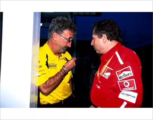 Formula One World Championship: Eddie Jordan Jordan Team Owner talks with Jean Todt Ferrari Sporting Director