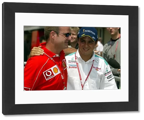 Formula One World Championship: Fellow Brazilians Rubens Barrichello of Ferrari with Felipe Massa of Sauber