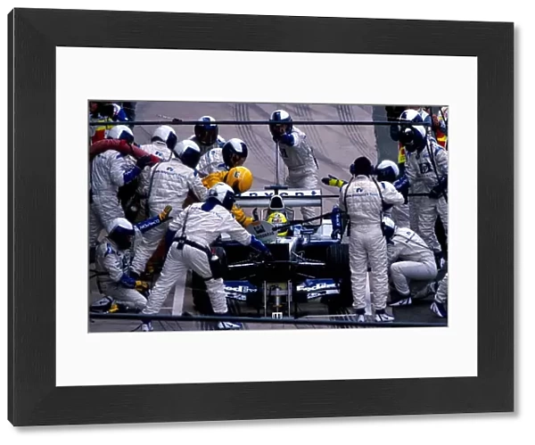 Formula One World Championship: Ninth placed Ralf Schumacher Williams BMW FW25 makes a pit stop