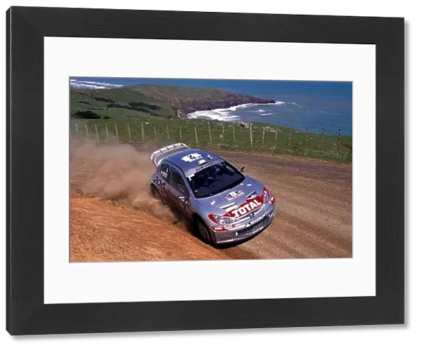 World Rally Championship: Rally winner and 2002 World Rally Champion Marcus Gronholm  /  Timo Rautiainen Peugeot 206 WRC