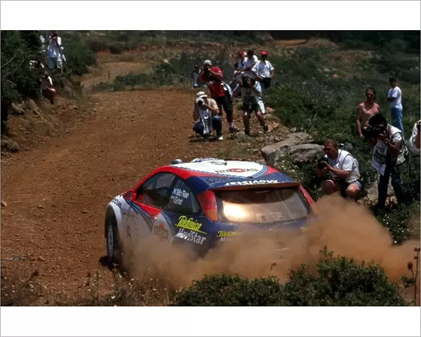 FIA World Rally Championship: Rally winner Colin McRae Ford Focus RS WRC 02, attracted photographers from behind every greek rock