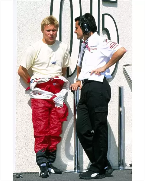 Formula One Testing: Mika Salo talks with Ange Pasquali Toyota Motorsport Team Manager