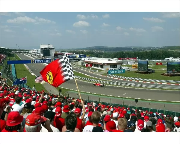 Formula One World Championship: Ferrari fans cheer on Michael Schumacher Ferrari F2002