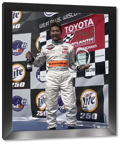 Roger Yasukawa is a happy man after the Toyota Atlantic race following the Miller Lite 250