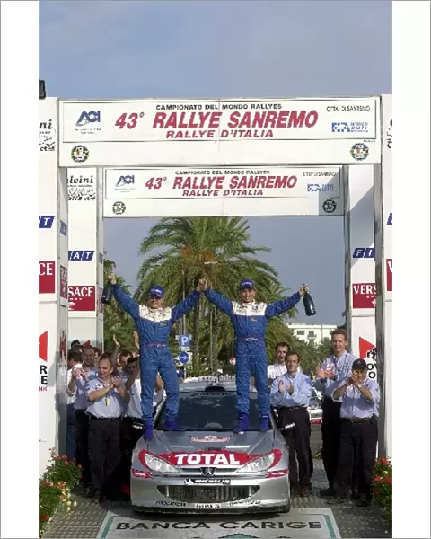 World Rally Championship: Gilles and Herve Panizzi Peugeot 206 WRC celebrate victory
