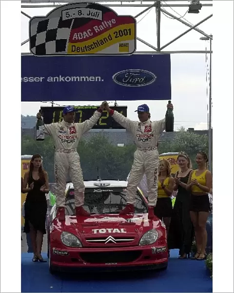 2001 Rally Deutschland: Philippe Bugalski and Jean-Paul Chiaroni celebrate victory