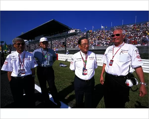Formula One World Championship: Ove Andersson President of Panasonic Toyota Racing entertains Toyota VIPs on the grid
