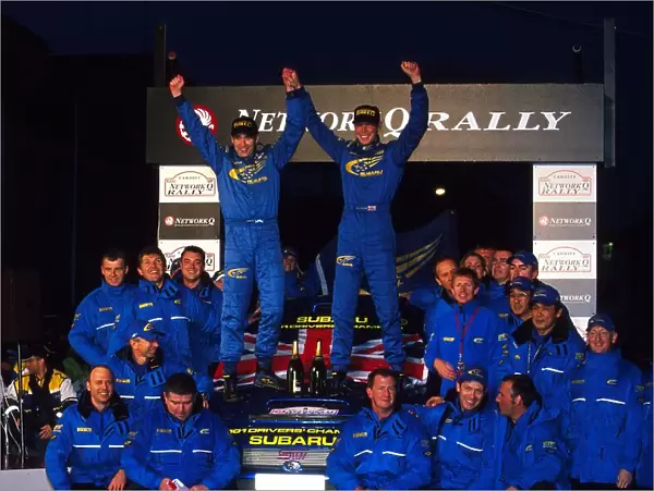 World Rally Championship: Richard Burns, right, and co-driver Robert Reid Subaru Impreza WRC celebrate Burns World Rally Championship