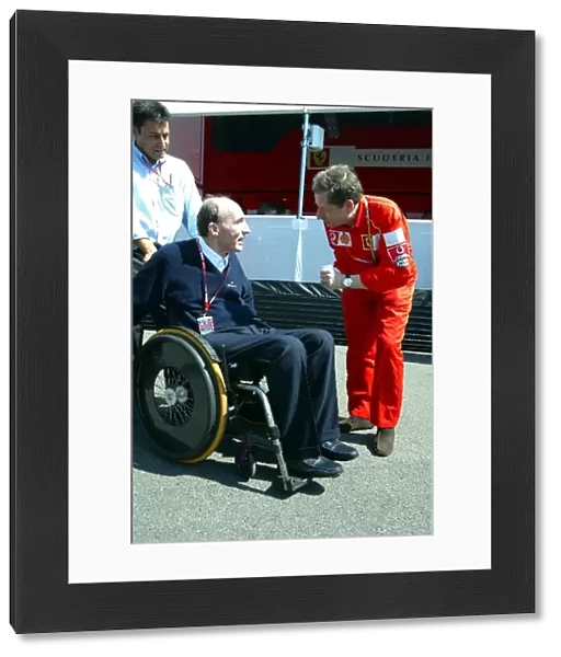 Formula One World Championship: Sir Frank Williams Williams Team Owner talks with Jean Todt Ferrari Team Sporting Director