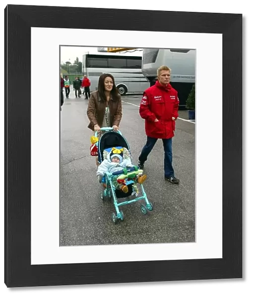 Formula One World Championship: Mika Salo Toyota with wife Noriko Endo and their young child