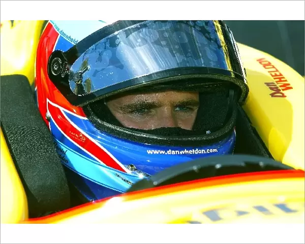 Indy Racing League: Dan Wheldon, Panther Racing, sports his home country flag on his helmet as he prepares to practice for his IRL debut in the